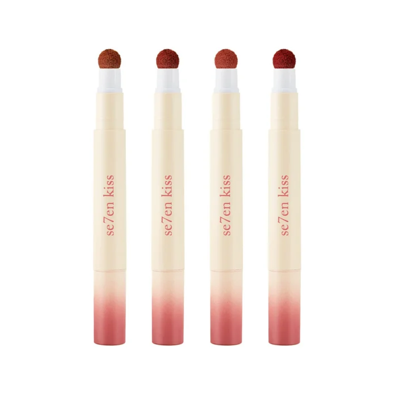 se7en-kiss-lip-powder-cream-matte-velvet-lip-gloss-see-g3phdzrn-1 se7en kiss Lip Powder Cream in a sleek tube, featuring a matte velvet finish and a fluffy brush tip for precise application.